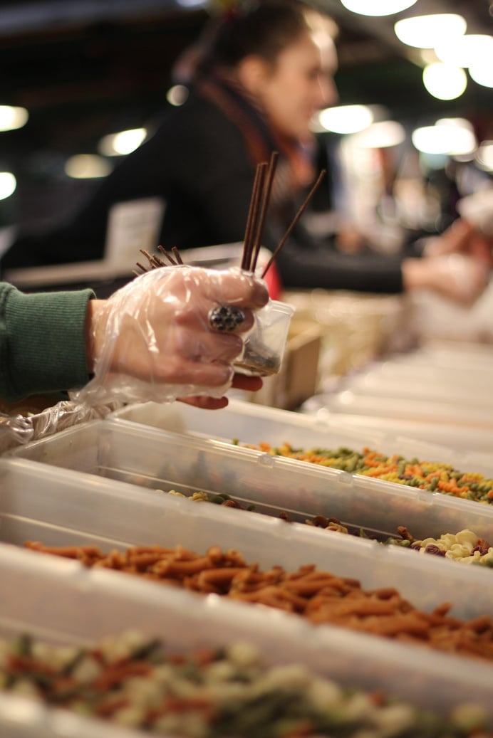 Pasta vendor handing out samples